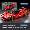 A red Supercar model kit in static version displayed next to its packaging box.