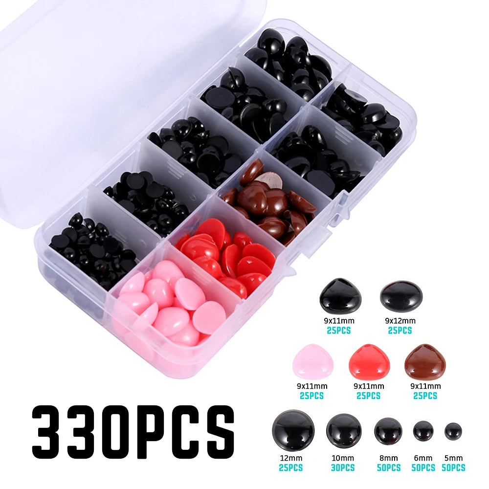 A clear plastic box filled with various black, red, and brown safety eyes and noses for dolls and stuffed animals.
