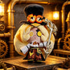 A soft 10cm collectible doll plush pendant featuring a character with large glasses and a yellow outfit, set against a brass 