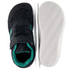 A pair of black and teal minimalist barefoot sneakers shown from the top view and sole view.