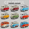 A collection of colorful vintage style metal bus diecast models in various colors and paint schemes.