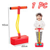 A red balance stone sensory training toy set with a yellow handle and red base, shown next to a child.