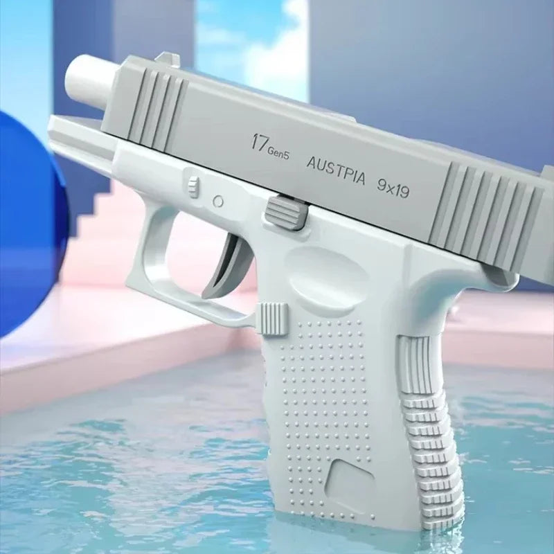 A white high-pressure water blaster rifle is shown resting in clear water.