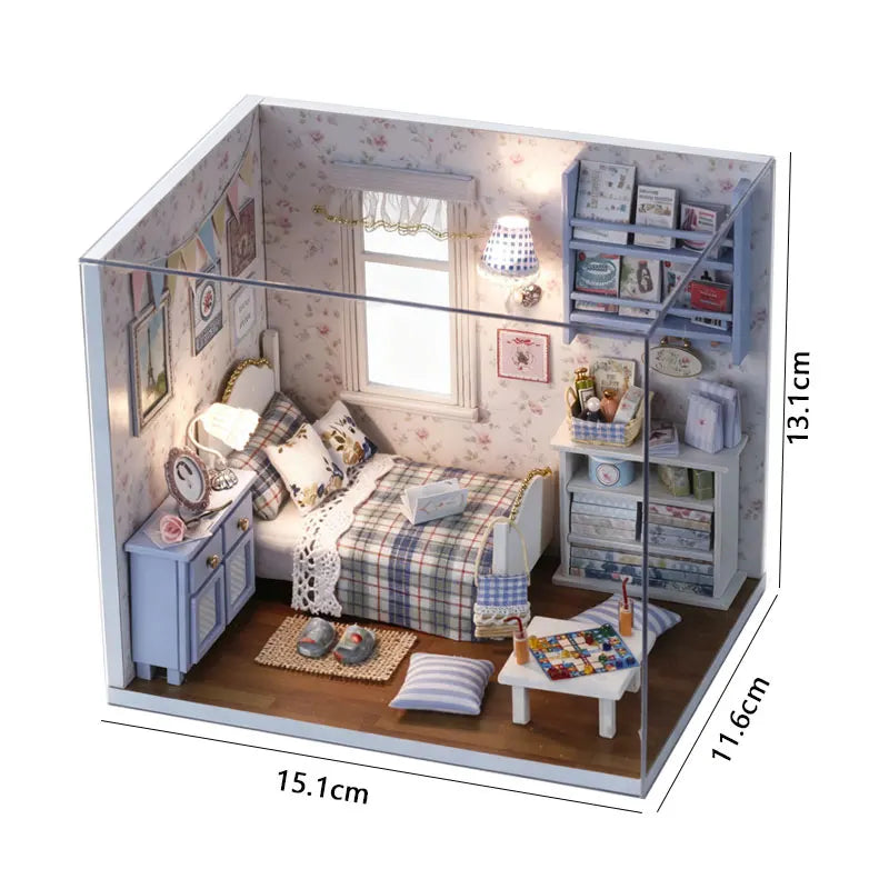 A wooden miniature dollhouse kit featuring furniture and decorative elements in a light blue and white theme.