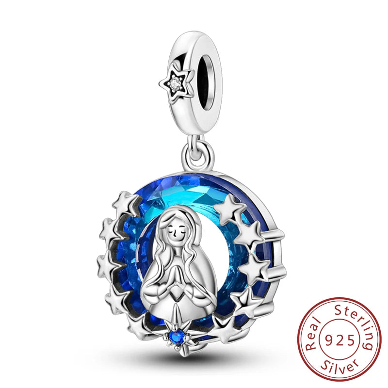 Sterling silver charm beads set featuring a cross, angel, and evil eye designs for DIY jewelry making