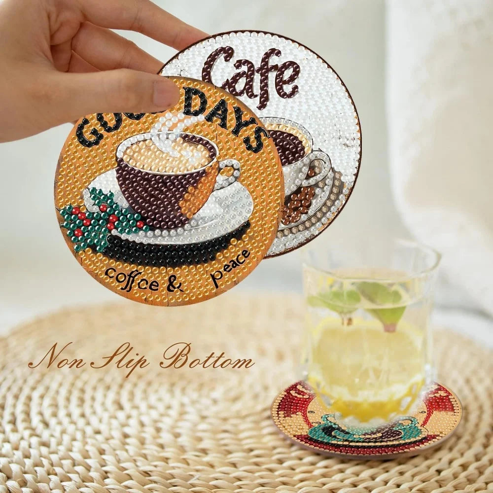 A hand holds a round diamond art coaster featuring coffee cups and the words Cafe Days