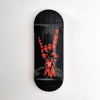 A black wooden fingerboard deck featuring a UV-printed graphic of a hand with long, red fingers.