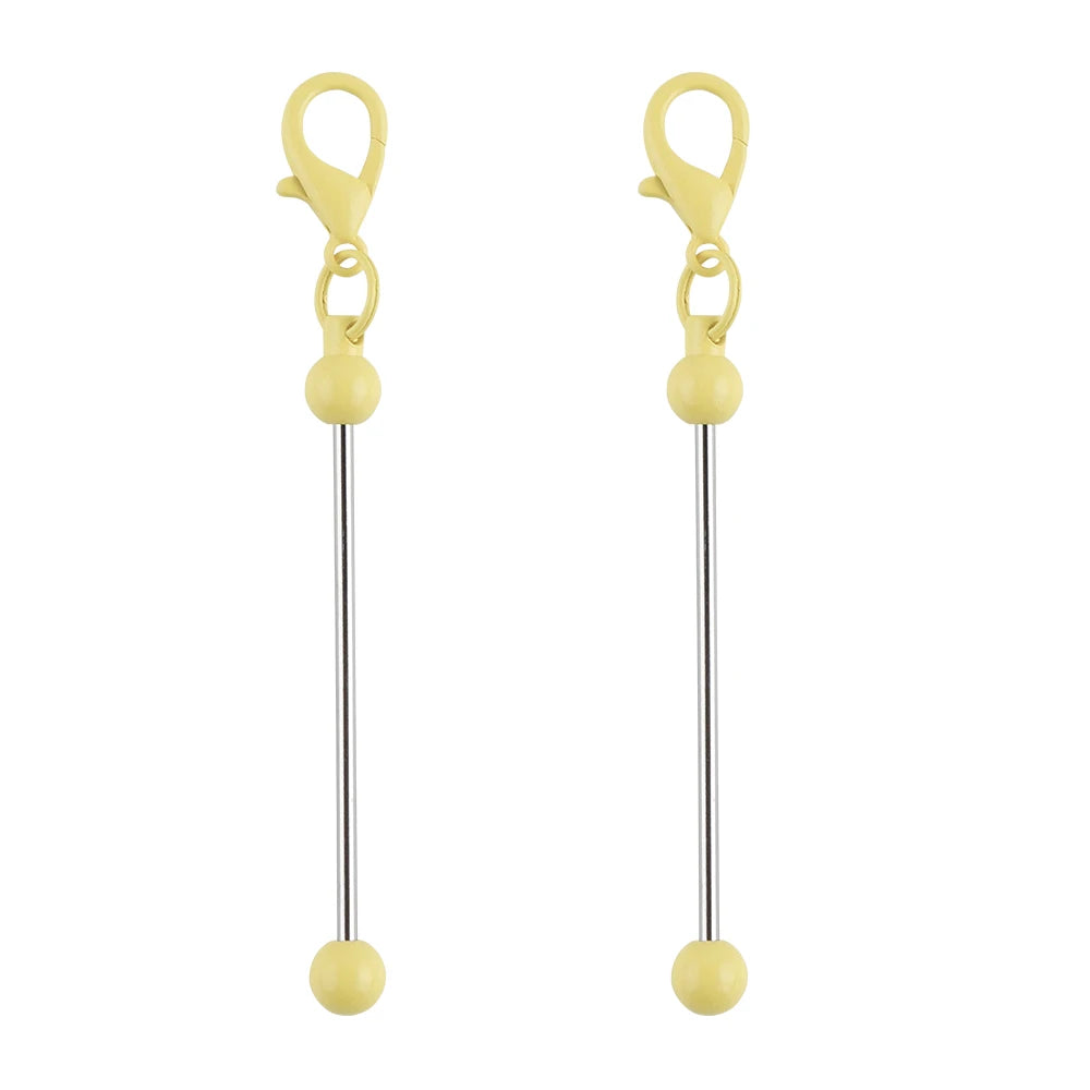 A pair of gold-colored metal keychain bars with lobster clasps for DIY jewelry making.