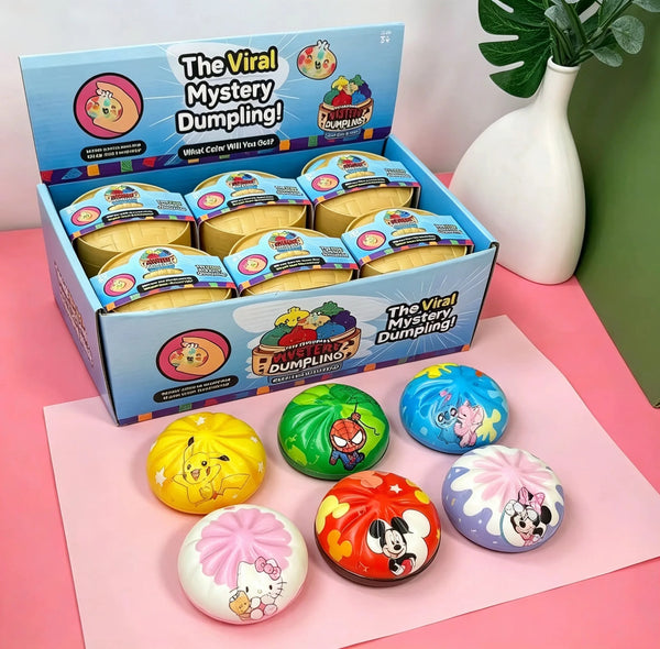 A box of The Viral Mystery Dumpling featuring various colorful squishy fidget toys and themed packaging.