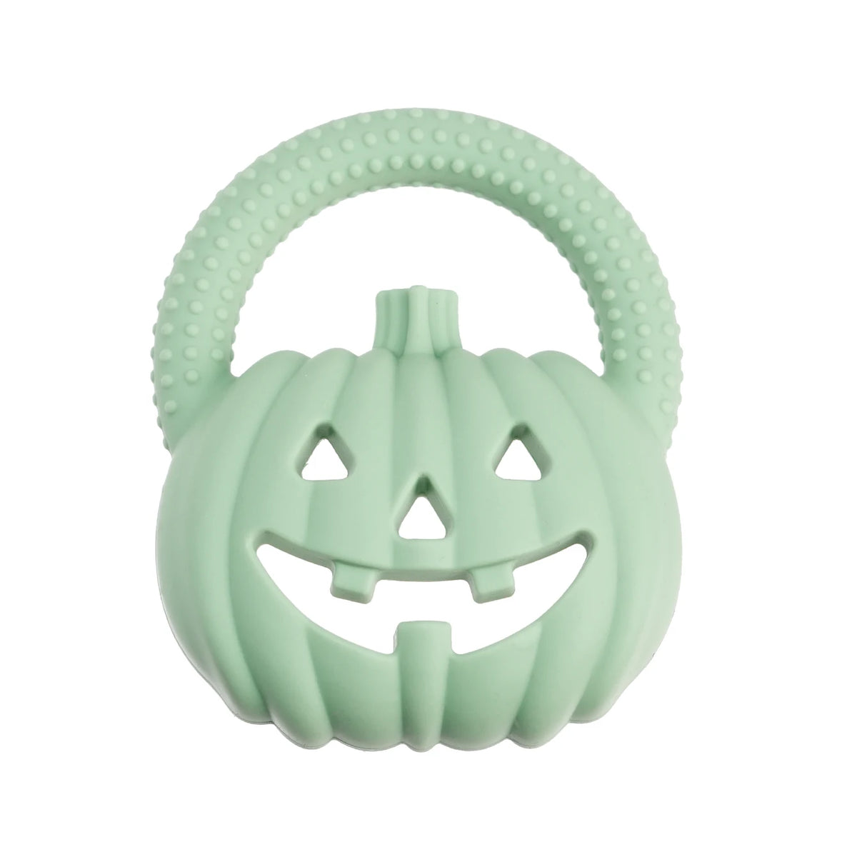 A light green silicone pumpkin baby teether with a textured handle and carved face features.