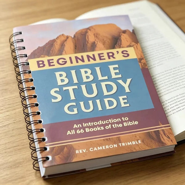A spiral-bound journal titled Beginner's Bible Study Guide for an introduction to all 66 books of the Bible by Rev. Cameron T