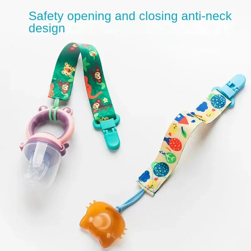 A set of four soft pacifier clips with double-sided prints in green, pink, and yellow colors.