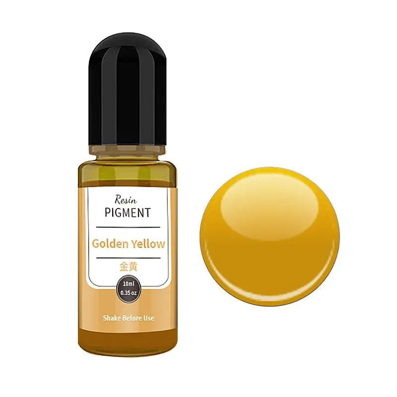 A glass bottle of Golden Yellow resin pigment next to a round yellow pigment disk.
