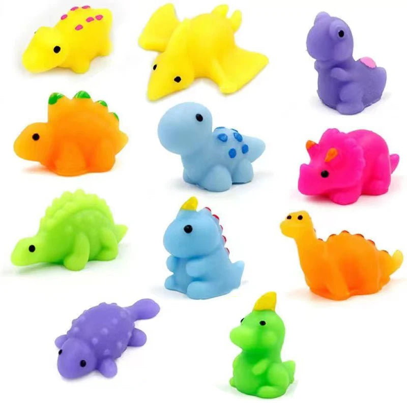 A collection of colorful squishy dinosaur fidget toys in yellow, orange, purple, and green.