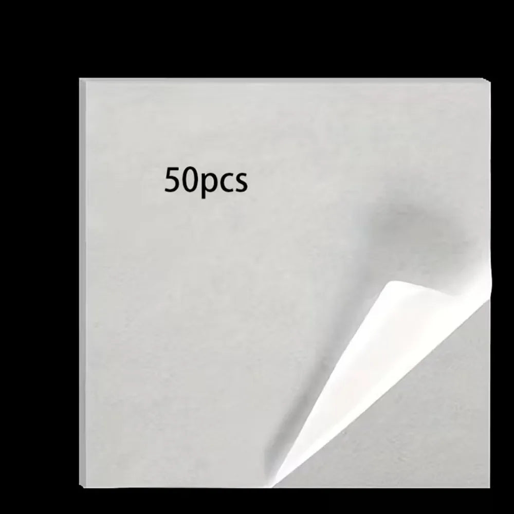 A white square piece of double-sided diamond painting release paper with the text 50pcs printed on it.