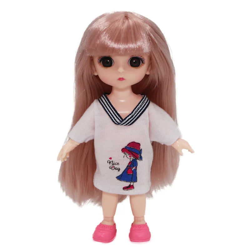 A 16cm articulated BJD princess doll with long pink hair wearing a light gray outfit and striped collar.