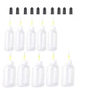 A collection of clear plastic squeeze bottles with blunt needle tips for precision dispensing.