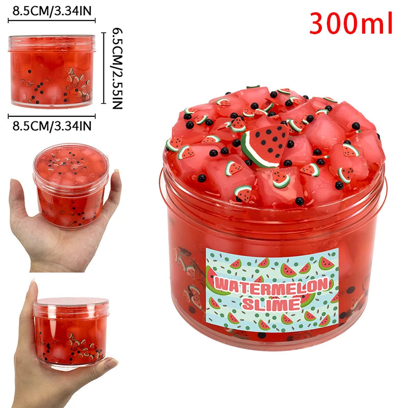 A jar of watermelon slime with fruit pieces and a sliced watermelon garnish, showing the texture and volume.