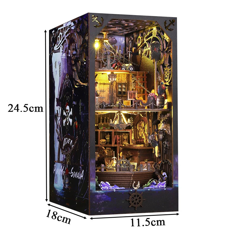 A wooden bookshelf insert model depicting a pirate ship scene with various nautical and antique items.