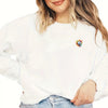 White long-sleeve shirt with a soccer ball splash art iron-on patch on the chest