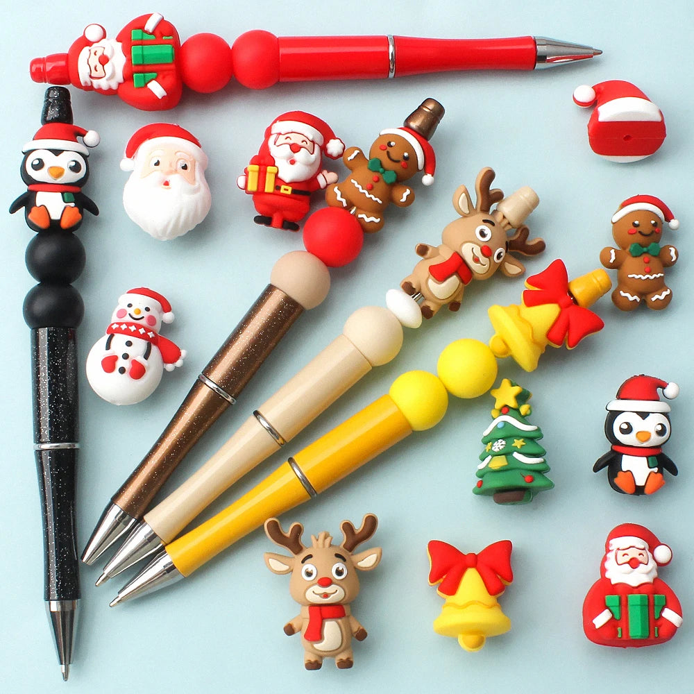 A collection of red and gold silicone beads, including Santa figures, reindeer, and Christmas trees, for crafting.