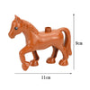 A brown plastic horse building block with a black eye, shown from the side.
