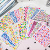 A colorful collection of mini deco cut film stickers in various shades and patterns arranged on a white surface.