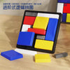 A black puzzle board containing various colored geometric tiles, including red, yellow, blue, and gray pieces.