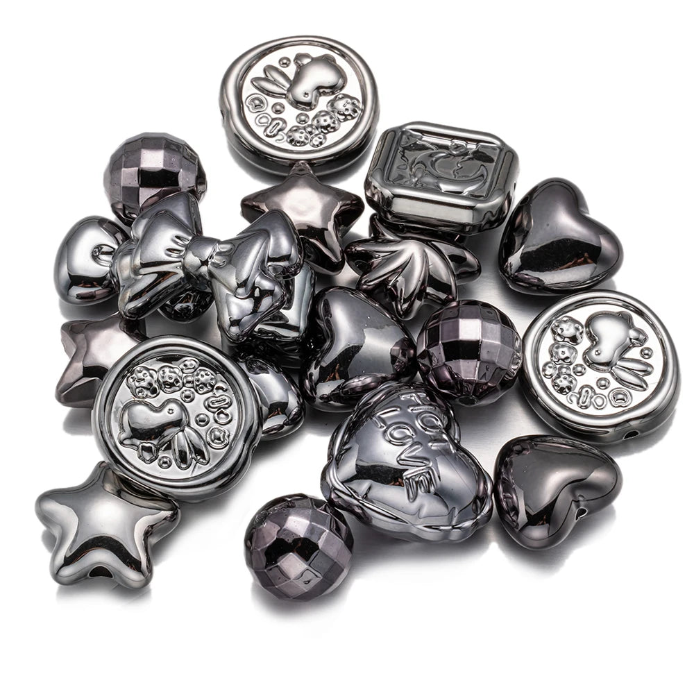 Silver-toned acrylic bow and flower beads in various shapes like hearts and stars for DIY jewelry making