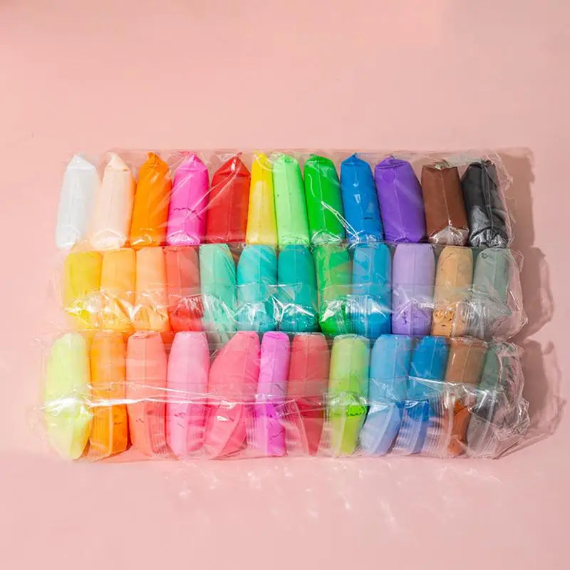A collection of colorful air dry clay modeling shapes in various shades and colors packaged in a clear plastic bag.