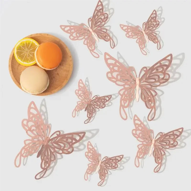 Rose gold 3D butterfly wall stickers arranged with a slice of lemon and an orange.