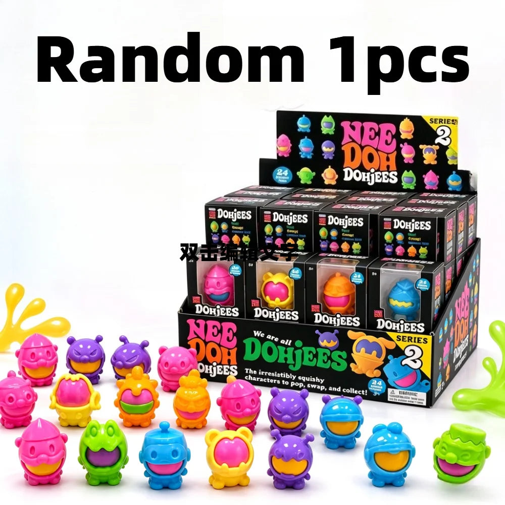 A collection of colorful Needoh DohJees squishy fidget toys in various shapes and colors.
