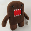 A brown plush toy resembling a bear with a red mouth showing sharp teeth.
