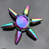 A rainbow metal fidget spinner with smooth silent rotation, featuring iridescent, pointed blades.