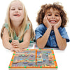 Two children smiling while interacting with a wooden magnetic maze puzzle board for learning