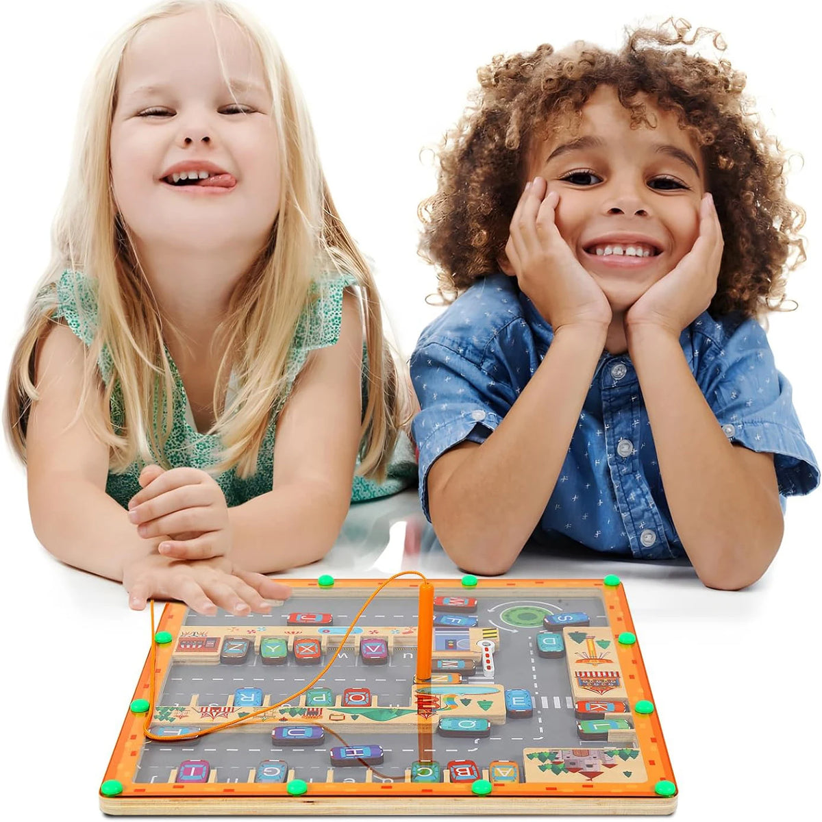 Two children smiling while interacting with a wooden magnetic maze puzzle board for learning