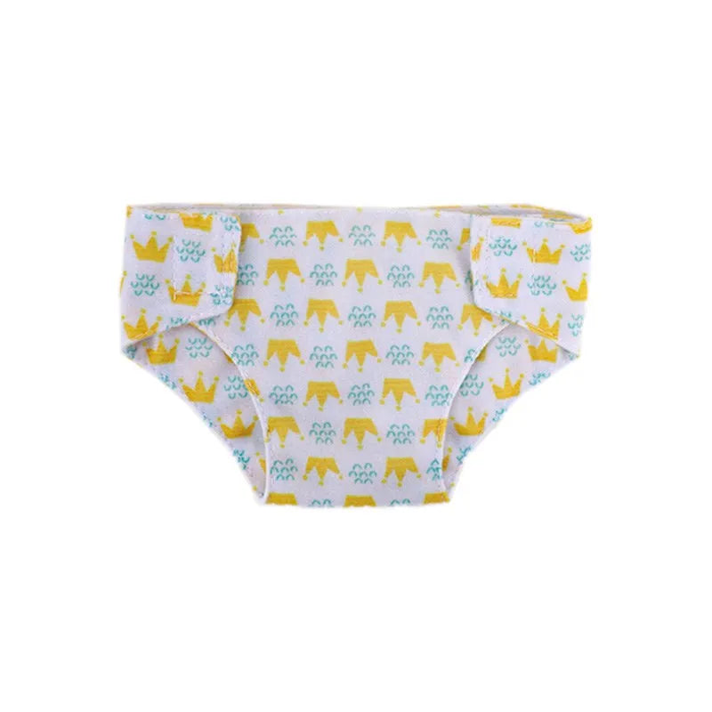White doll underwear featuring yellow crown and elephant patterns