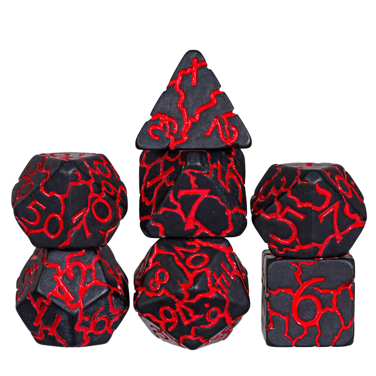 A set of seven black polyhedral dice with red markings, including a pyramid shape and a cube.