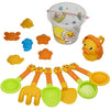 A kids beach sand play set featuring a clear bucket and various orange and yellow plastic toys including a shovel and a mold.