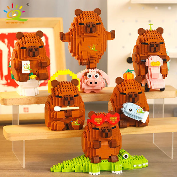 Orangen und pinke Bären-Bausteine mit großem Bären, kleinem Bären und Capybara-Figur