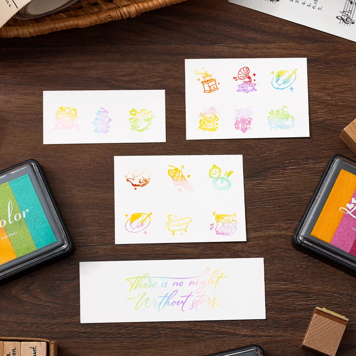 A set of six large rectangular rainbow gradient ink pads for stamping and crafts displayed on a wooden surface.