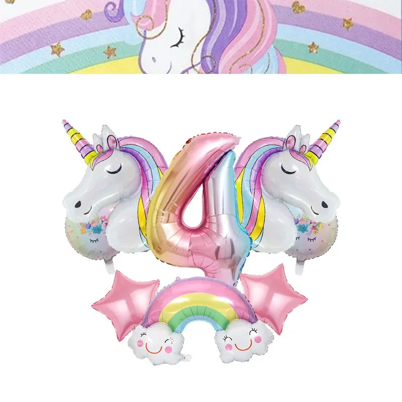 A foil balloon shaped like the number 4 in pink and purple unicorn colors with a rainbow decoration.