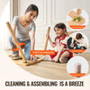 A girl is assembling a wooden sensory activity table for kids using tool-free assembly components.