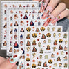 A hand displays vintage angel and saint nail art stickers featuring cherubs and crosses on a white background.