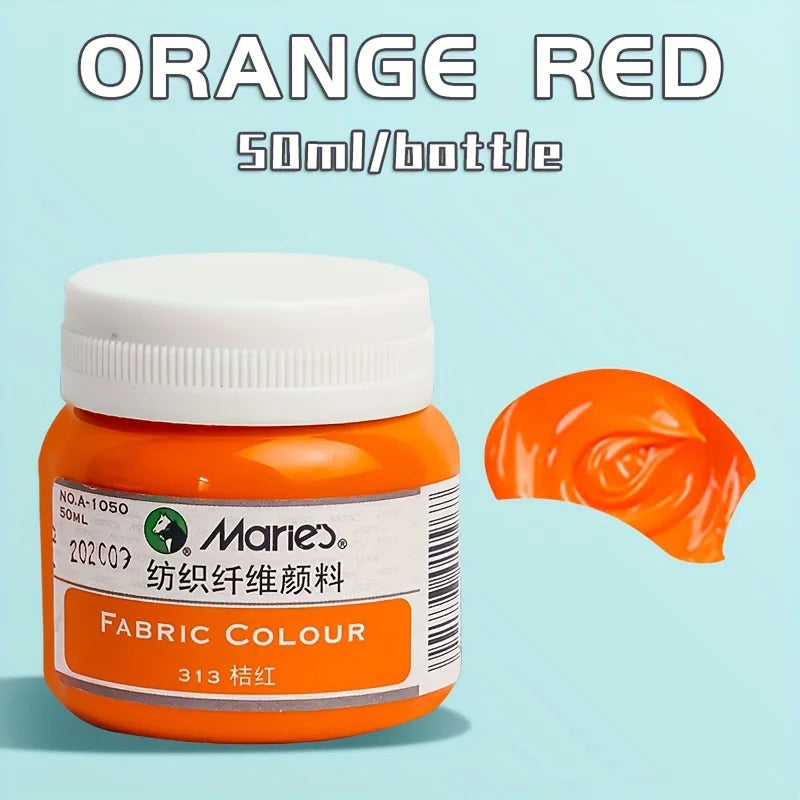 A bottle of orange red fabric colour paint labeled Marie's 50ml bottle with an orange-colored swatch.