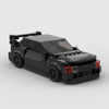 A black classic supercar model built from LEGO-style building blocks.