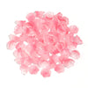 A pile of pink cherry blossom flower glass beads for jewelry making