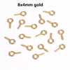 A collection of 8x4mm gold mini eye pins with screw threads for jewelry making.