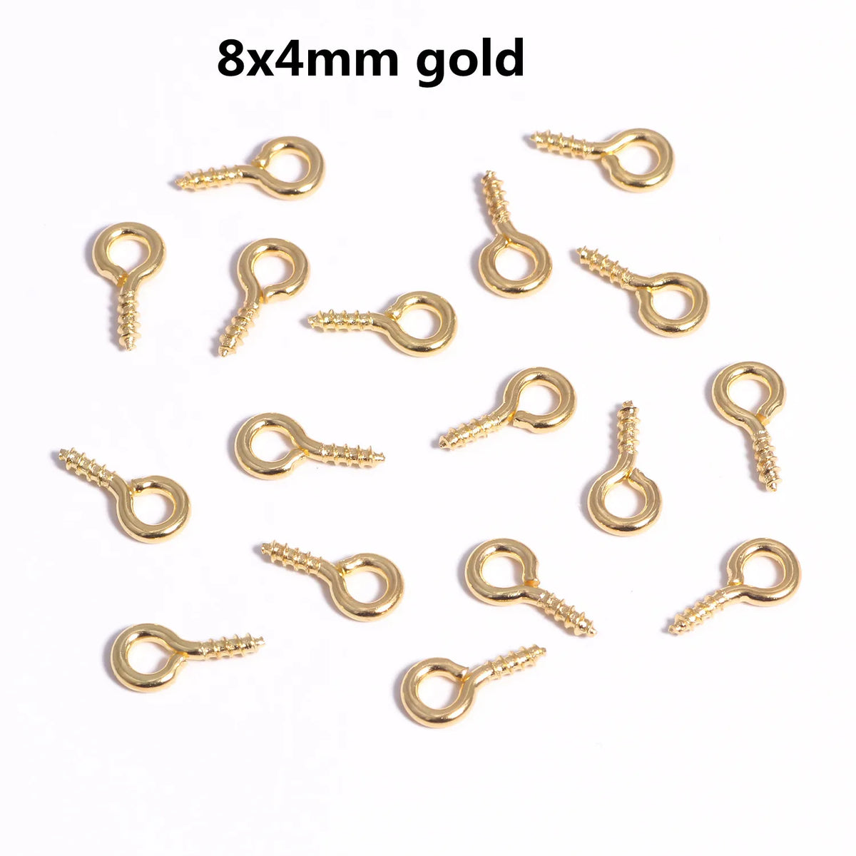A collection of 8x4mm gold mini eye pins with screw threads for jewelry making.