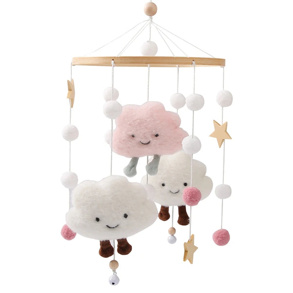 A wooden rattle mobile pendant featuring soft cloud shapes and star charms suspended by thin strings.